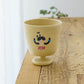 Cup cat and girl, yellow | Aya Watanuki
